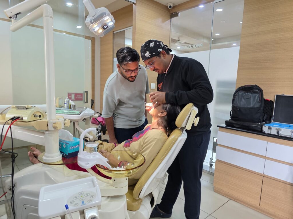 Dental treatment on a patient at Jain Dental Clinic